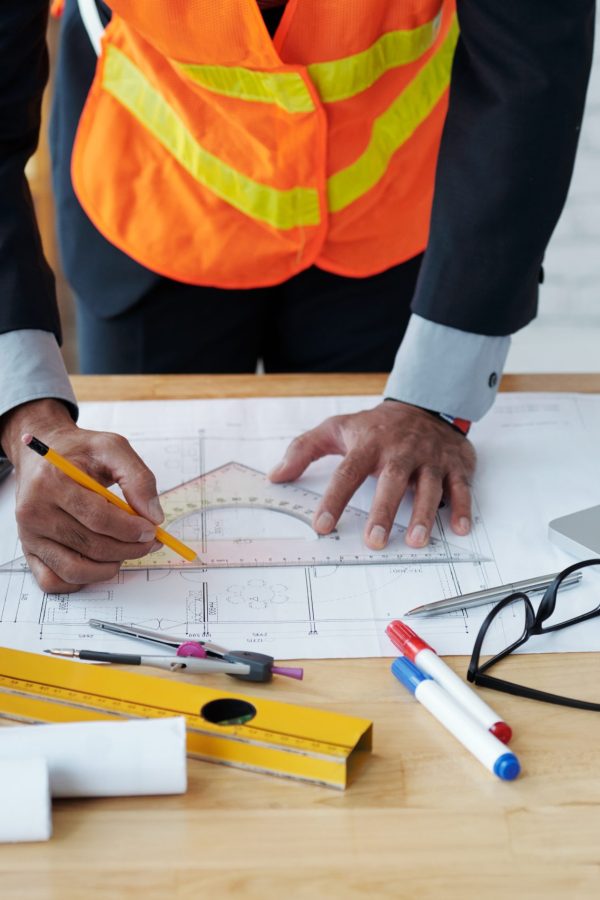 Cropped image of engineer drawing construction plan